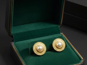 lightweight daily wear studs online gold plated minimal earrings India affordable pearl studs under 1000 crystal floral earrings for gifting black drop earrings with pearls spiral gold studs minimalist design tarnish resistant golden hoops guardian angel wing pendant gold champagne pearl earrings online India orbit design double hoop earrings