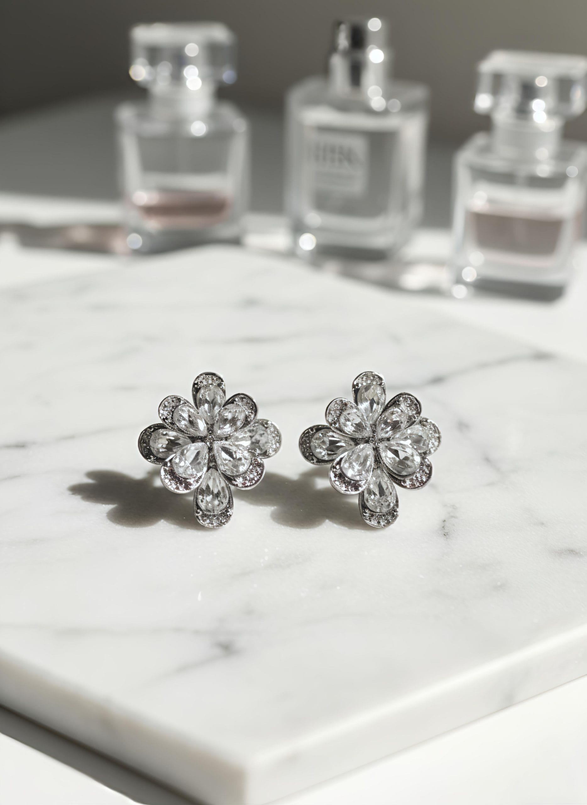 lightweight daily wear studs online gold plated minimal earrings India affordable pearl studs under 1000 crystal floral earrings for gifting black drop earrings with pearls spiral gold studs minimalist design tarnish resistant golden hoops guardian angel wing pendant gold champagne pearl earrings online India orbit design double hoop earrings